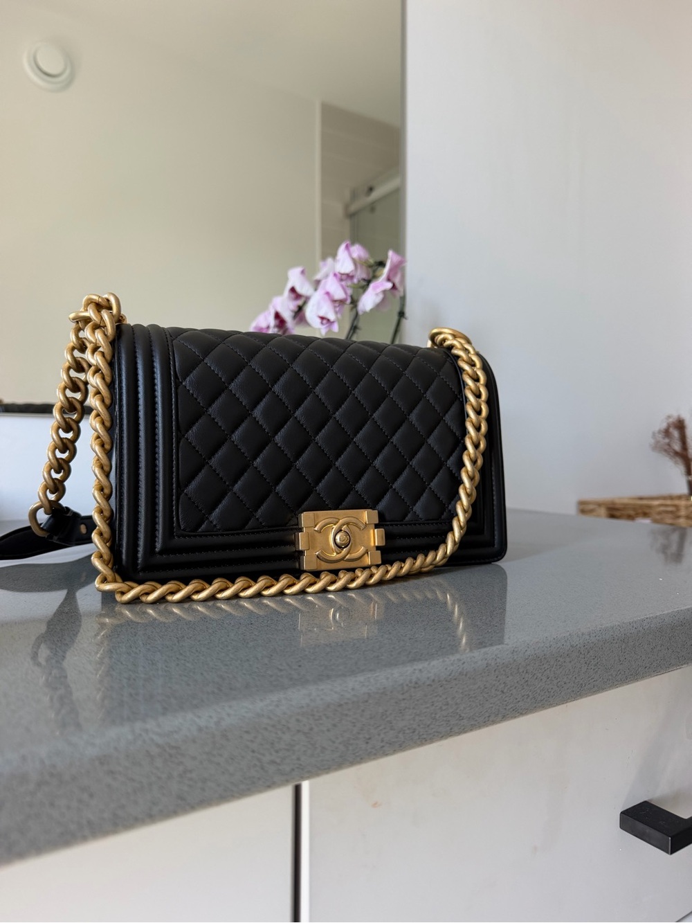 CHANEL Black Quilted Leather Boy Bag with Gold Chain